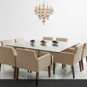 El Comedor Marfil es una expresión de elegancia y sofisticación. Su amplia mesa rectangular con tapa de cristal templado ofrece una superficie limpia y luminosa que refleja la luz, mientras que las ocho sillas tapizadas en un delicado tono marfil crean un ambiente sereno y lujoso. Este conjunto destaca por su capacidad para recibir hasta ocho comensales con total comodidad y estilo.
