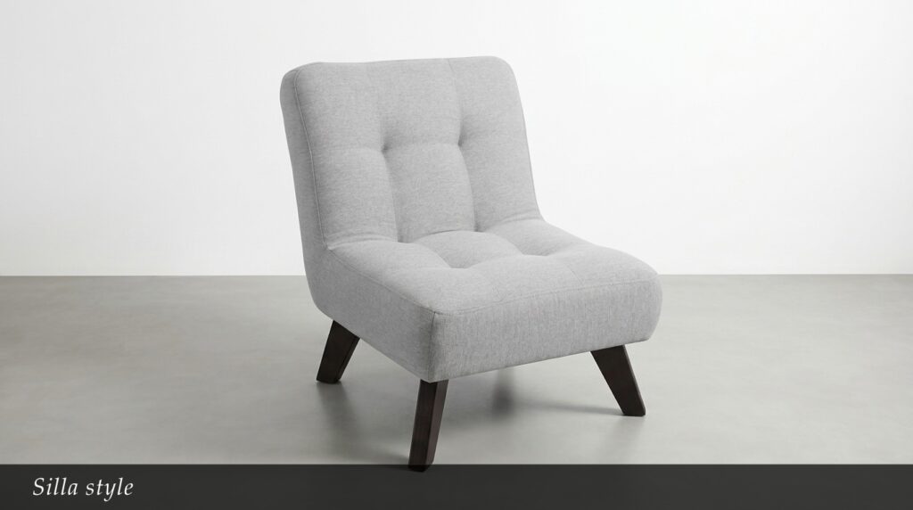 La Silla Style destaca por su diseño moderno y envolvente, pensado para brindar comodidad y sofisticación en un solo mueble. Su tapizado en tonos neutros y su acabado acolchado aportan una apariencia elegante que se adapta fácilmente a espacios contemporáneos.